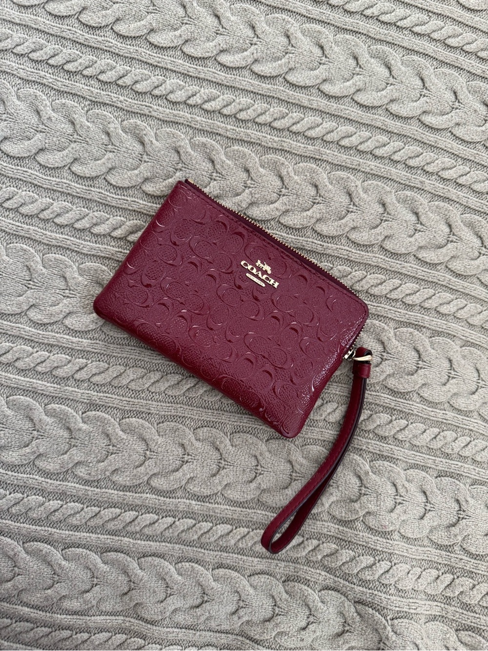 Coach Embossed Signature Wristlet in Sparkly Burgundy with Gold Logo